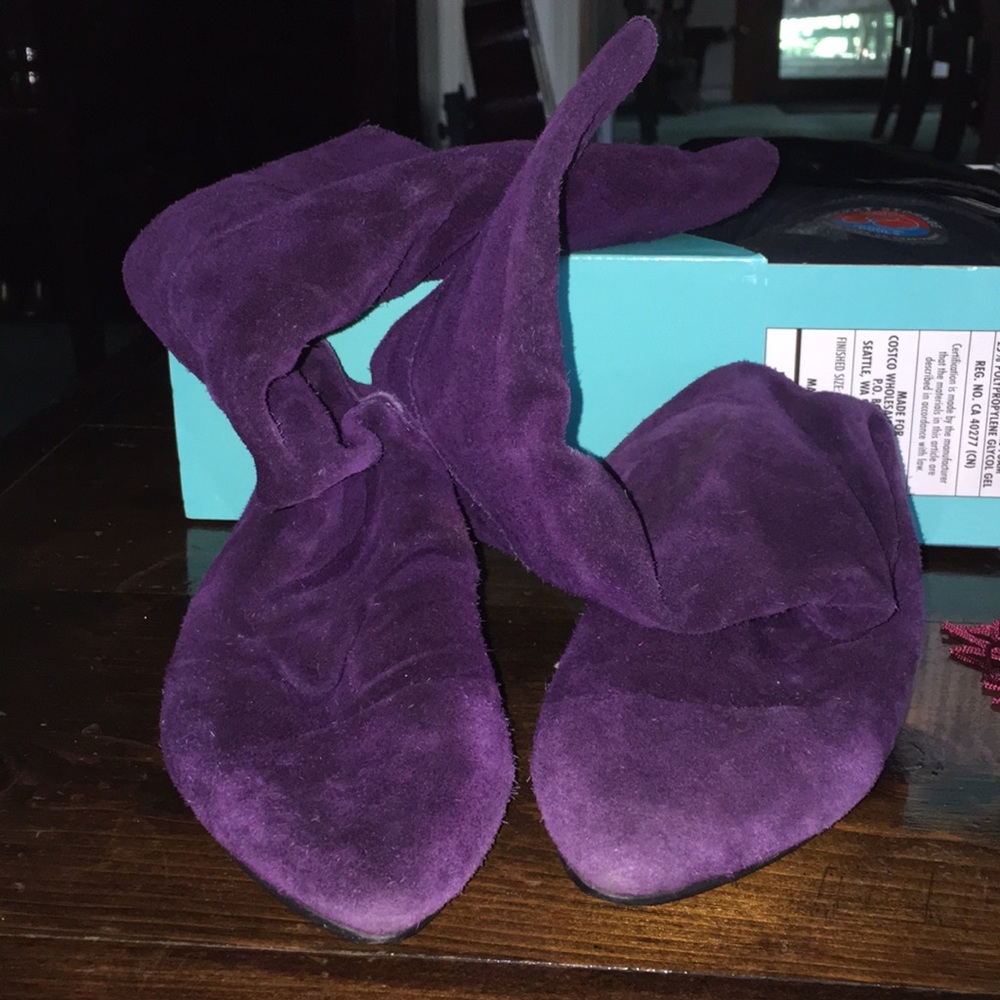 Purple colored below the knee boots